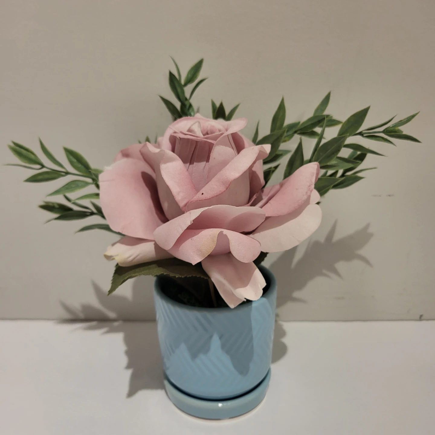 Pink Artificial Rose in Blue Ceramic Pot