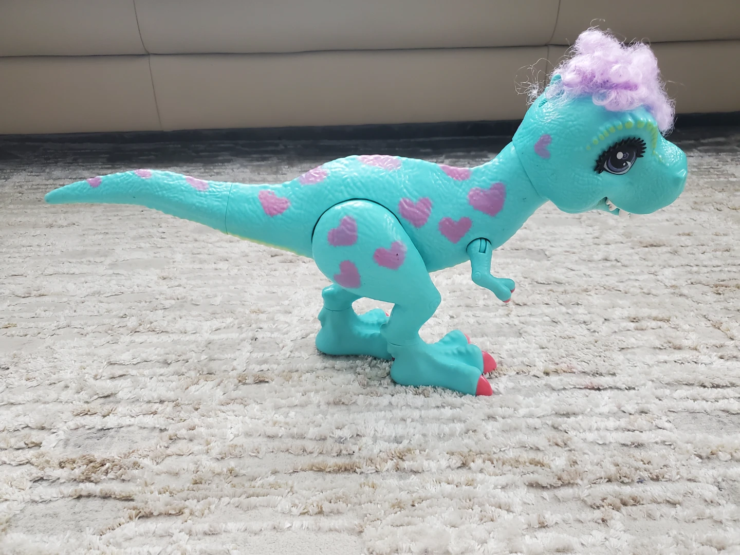 Blue Dinosaur Toy with Pink Hearts and Purple Hair