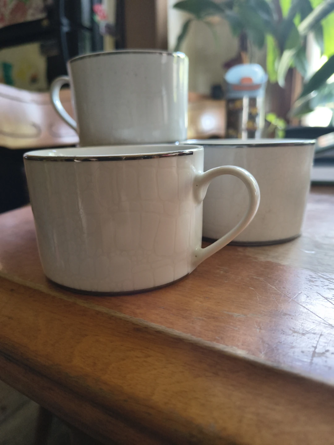 Set of 4 White Ceramic Coffee Cups with Silver Trim