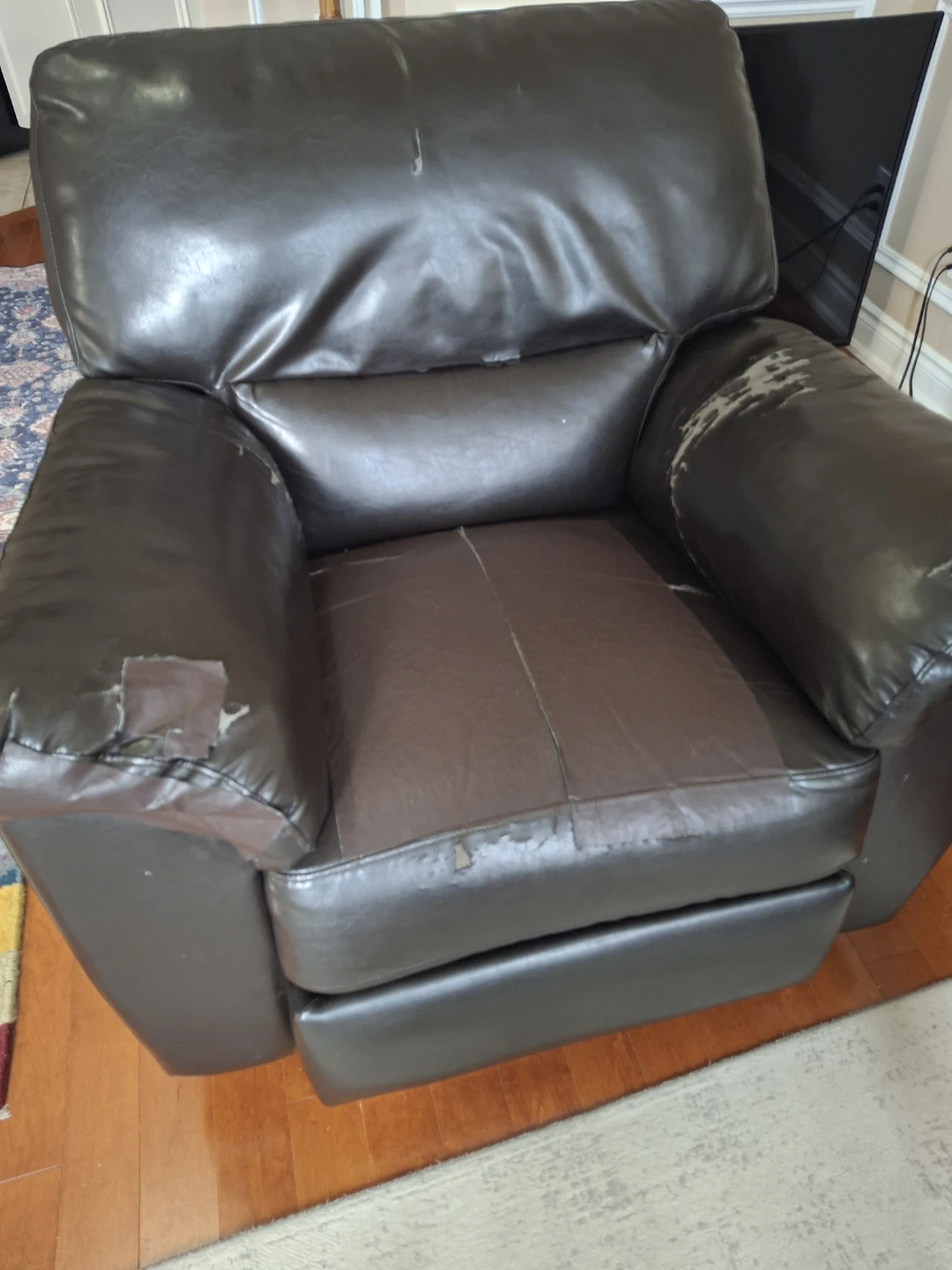 Brown Faux Leather Recliner - fabric aged