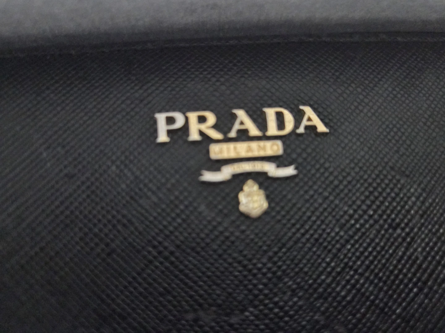 Prada Black Saffiano Leather Zip Around Wallet