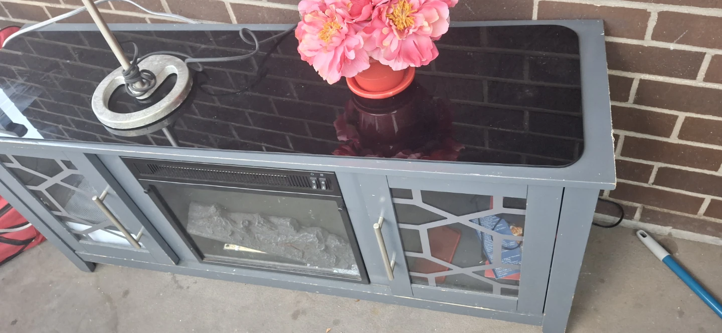 PIck by Today - Electric Fire place works and heats  TV Stand.