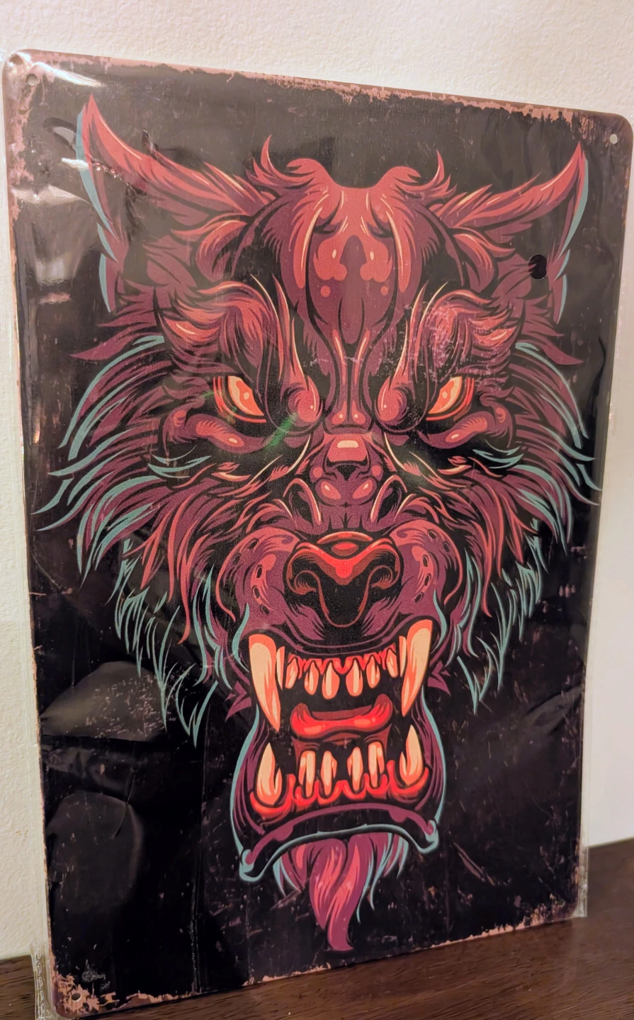 Metal Sign with Fierce Wolf Design 12x8