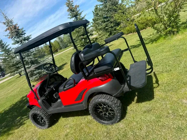 Red Golf Cart with Custom Wheels