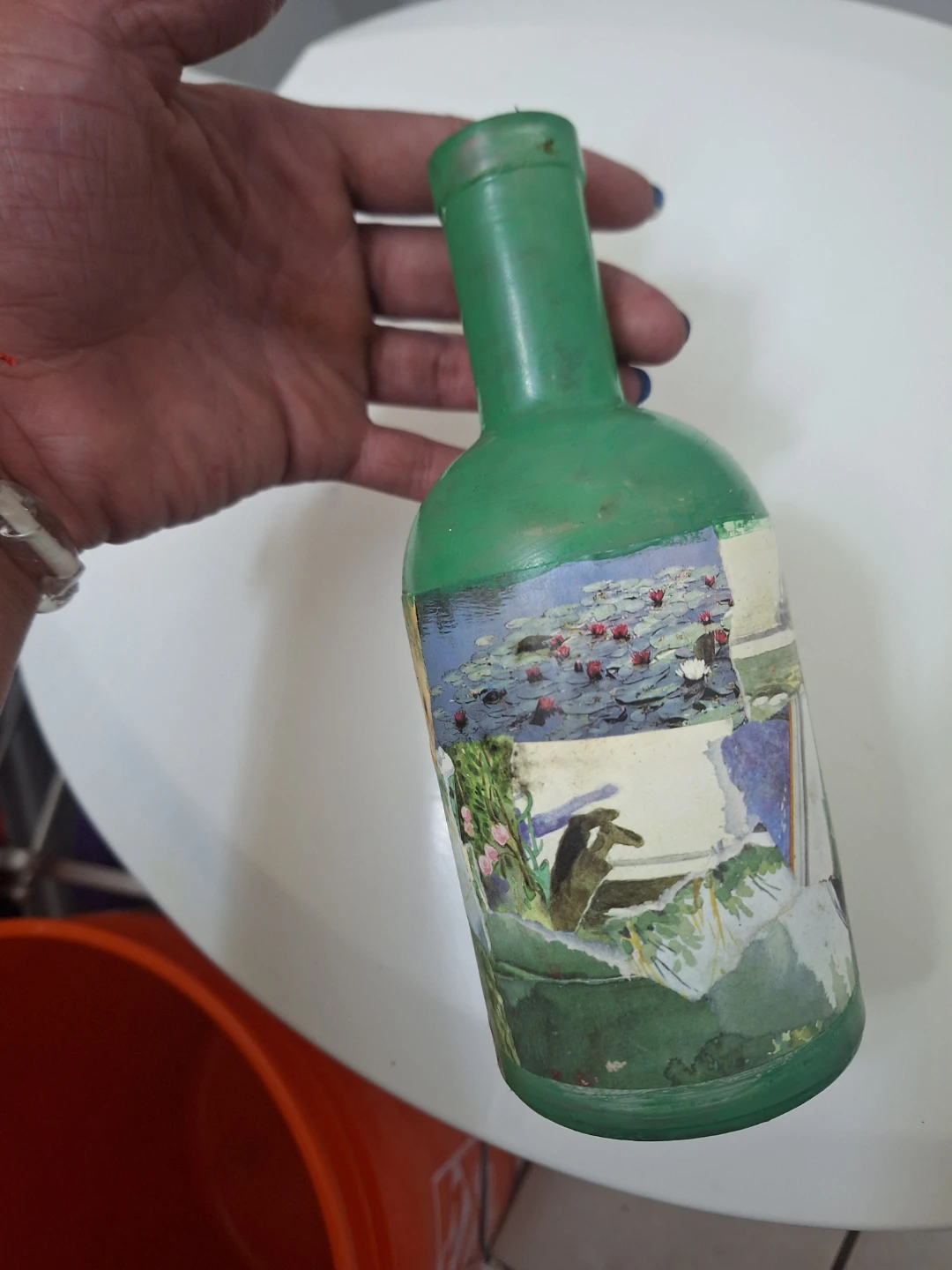 Decorative Green Bottle with Water Lilies Art