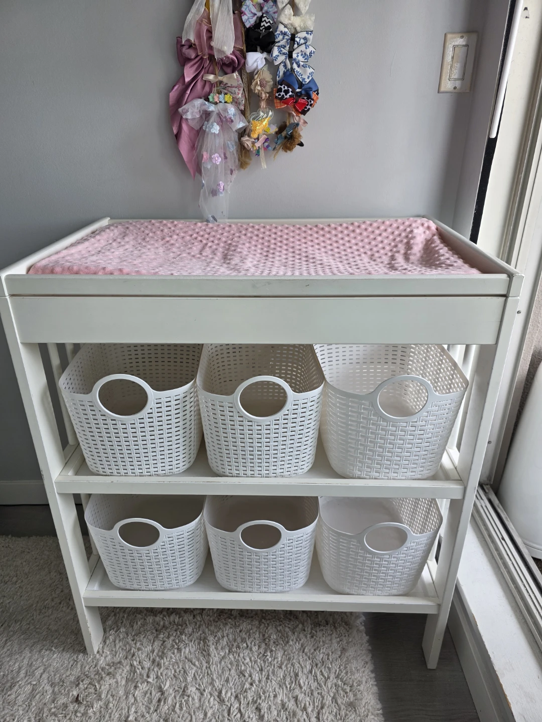 Baby changing table with accessories