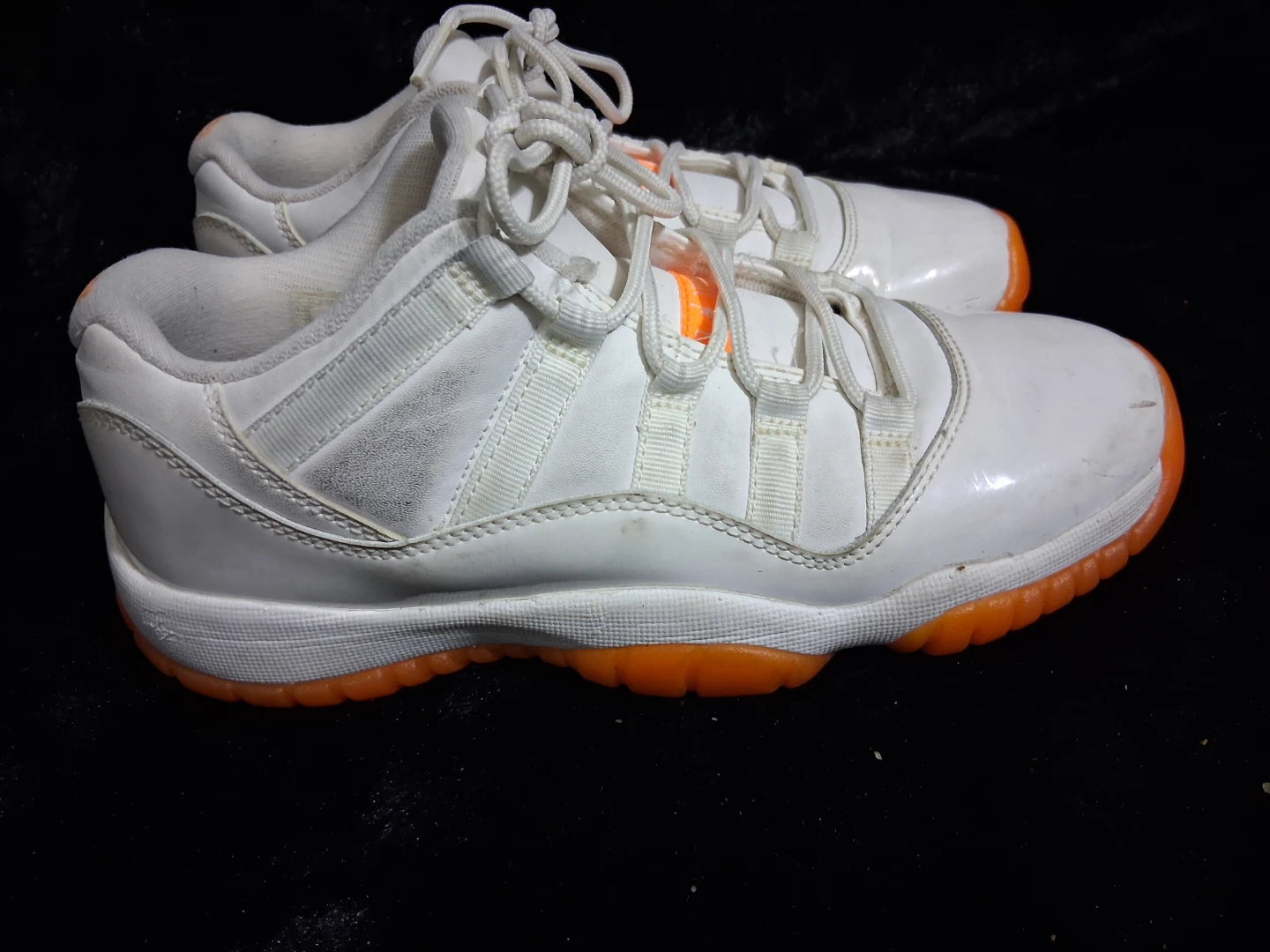 Air Jordan 11 Low White Orange Sneakers