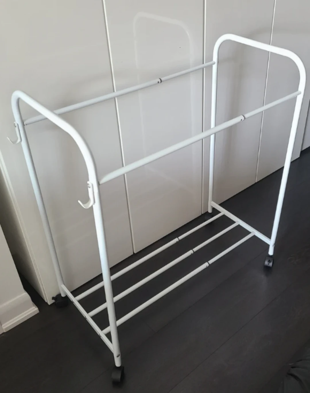 Expandable White Metal Rolling Clothes Rack - photo 2