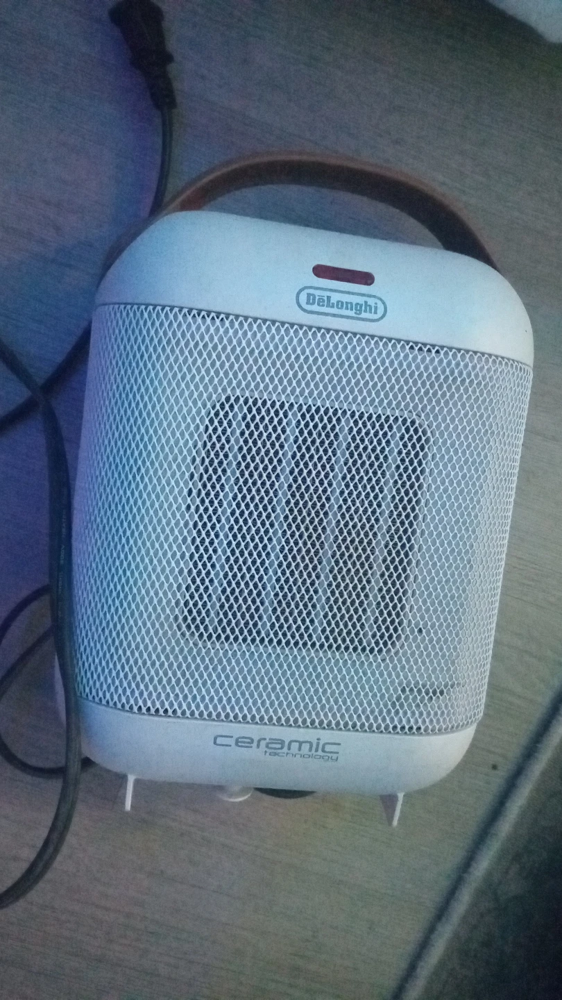 DeLonghi Capsule 1500W Ceramic Space Heater in White