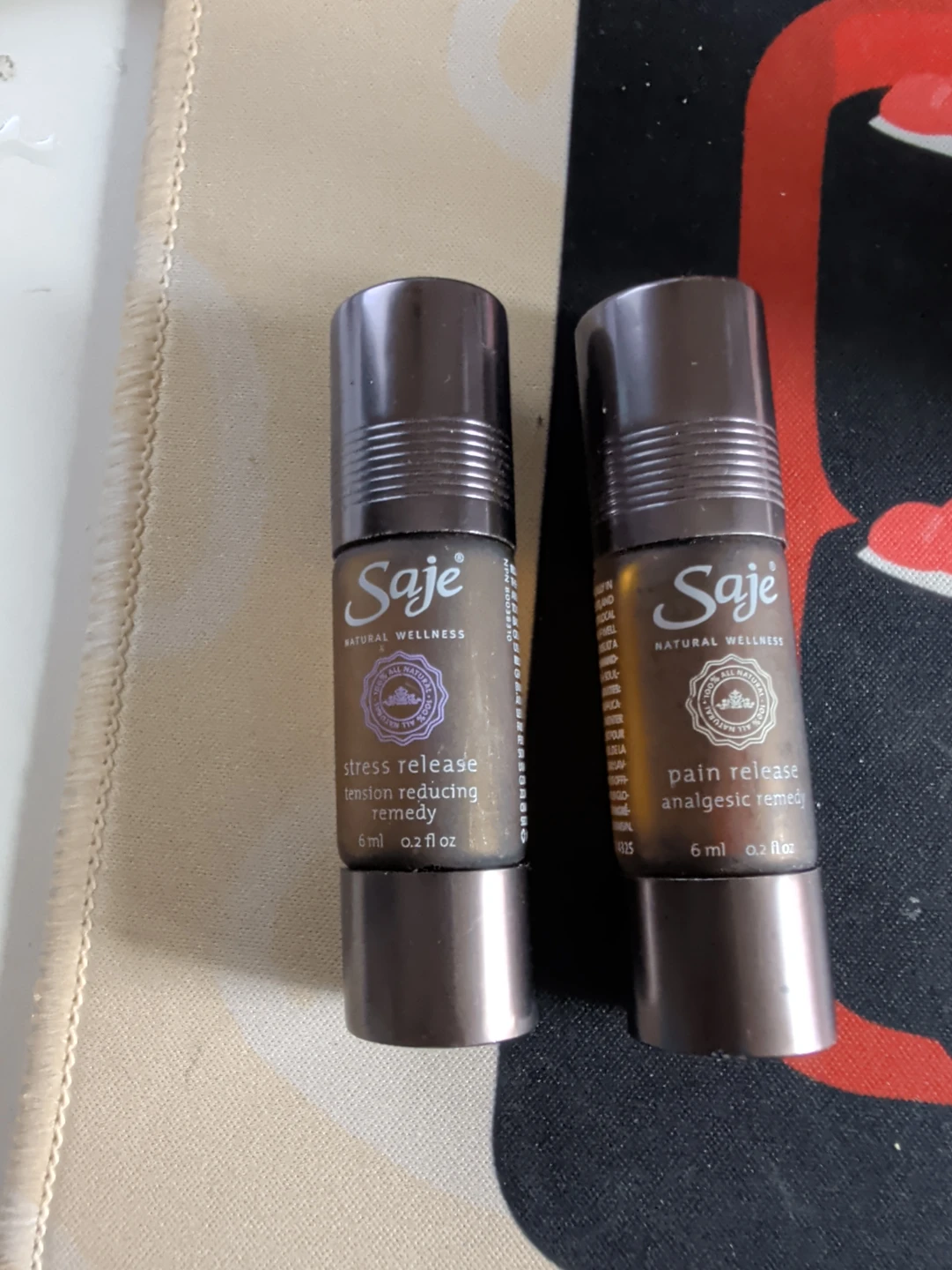 Saje Stress Release & Pain Release Rollerballs - 6ml each