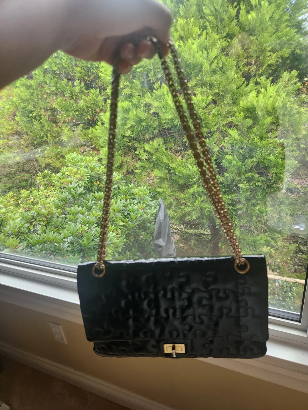 100% authentic  chanel puzzle-embossed handbag