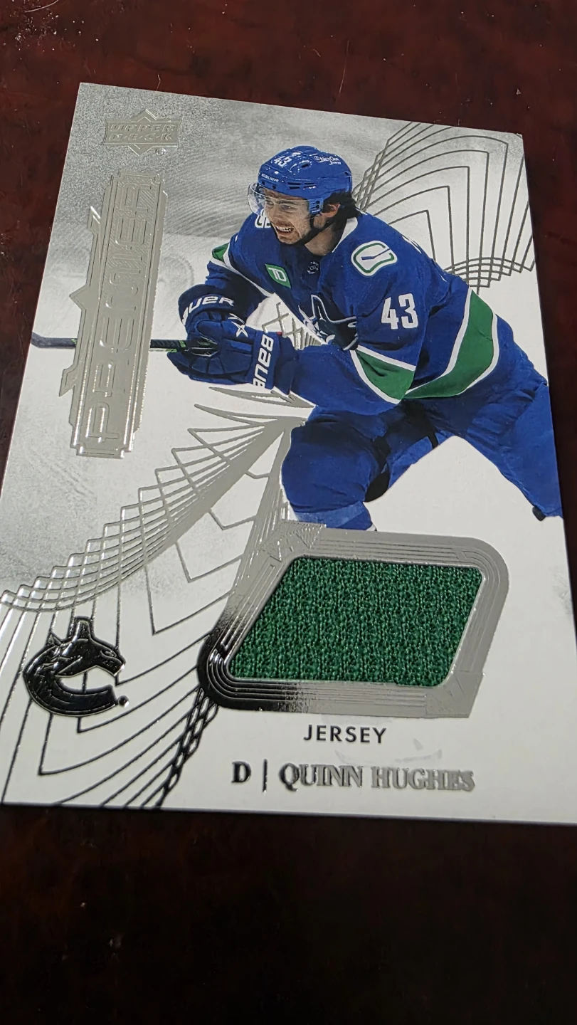 Quinn Hughes 2022-23 Upper Deck Premier Hockey Jersey Card