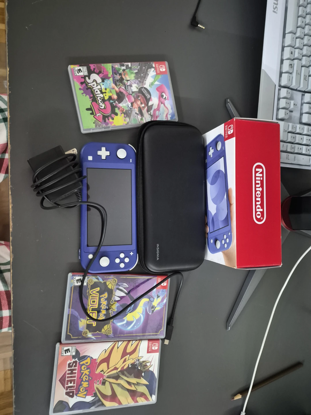 Nintendo Switch Lite Blue with Games and Case