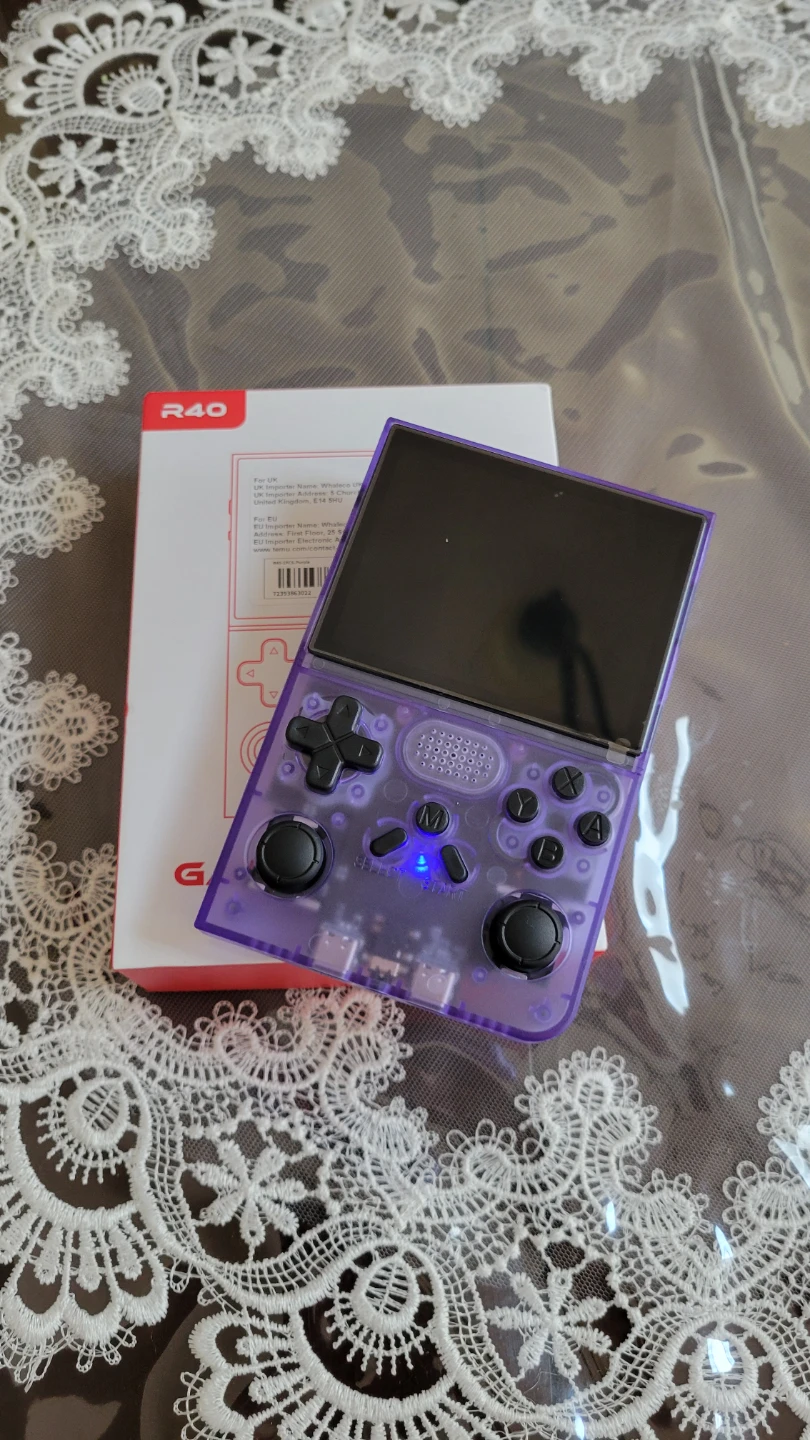 Purple Portable Handheld Gaming Console with Dual Analog Sticks