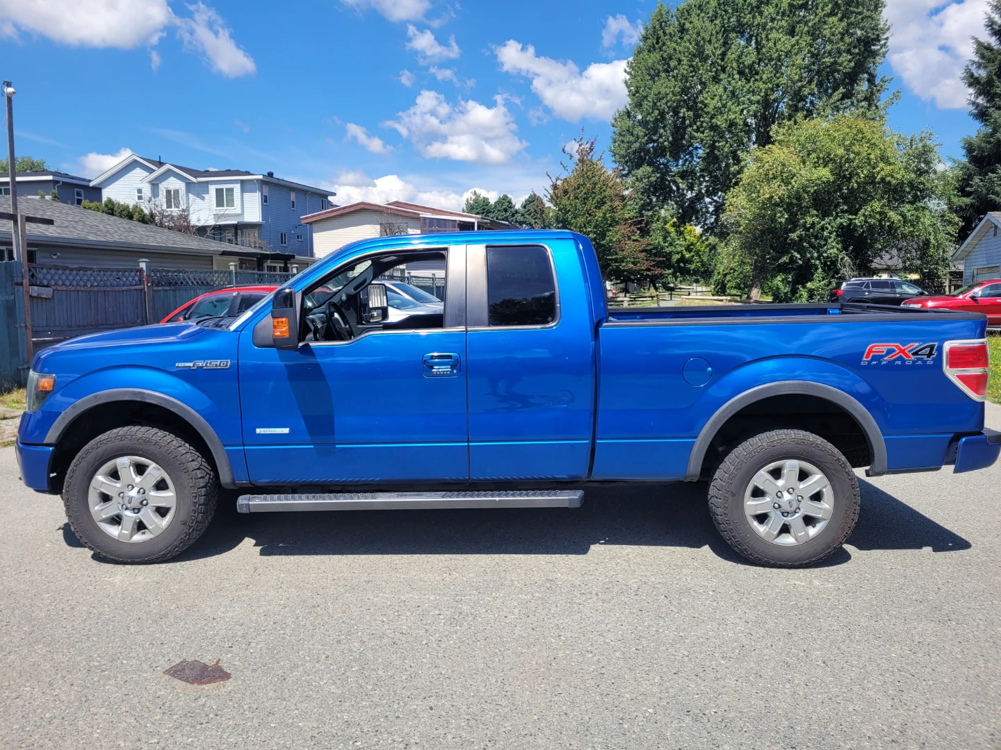 Blue Ford F-150 FX4 Off-Road Pickup Truck - photo 4
