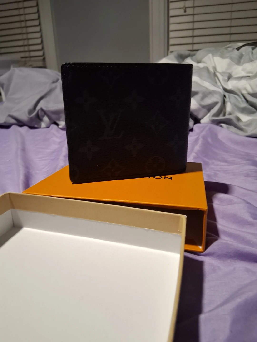 Louis Vuitton Monogram Bi-Fold Wallet