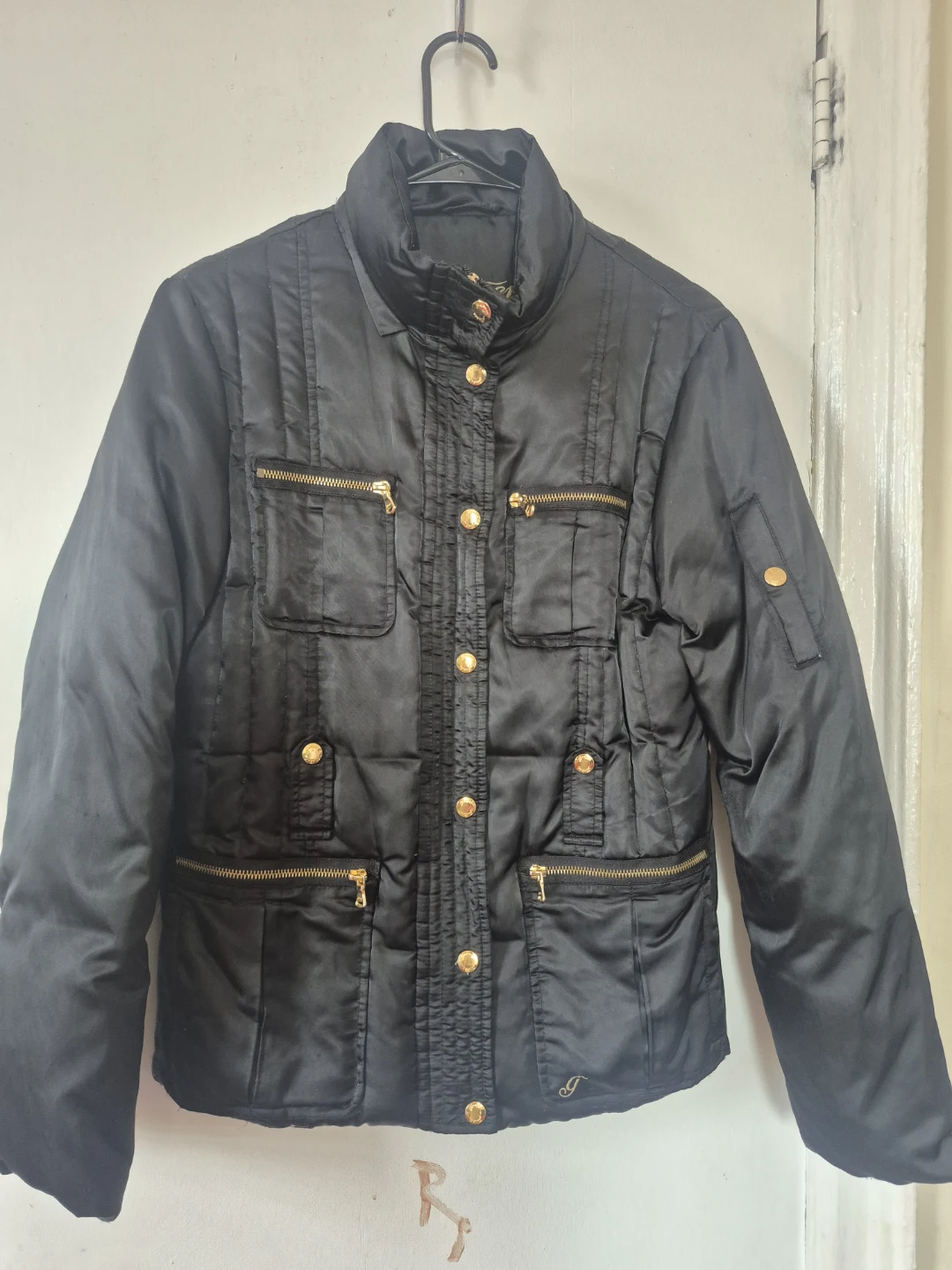 Black Quilted Jacket with Gold Accents