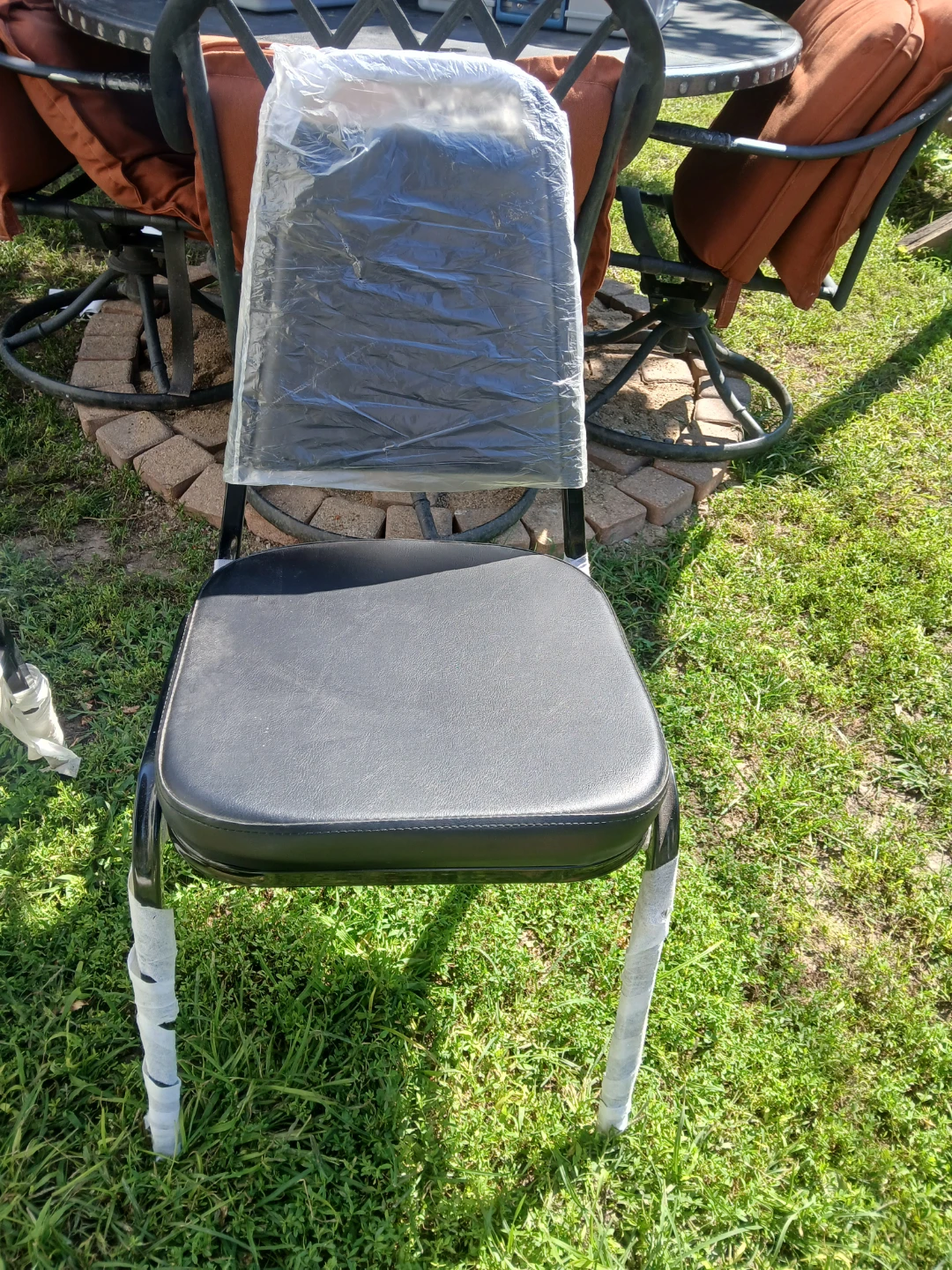 Black Metal Stackable Chair with Padded Seat