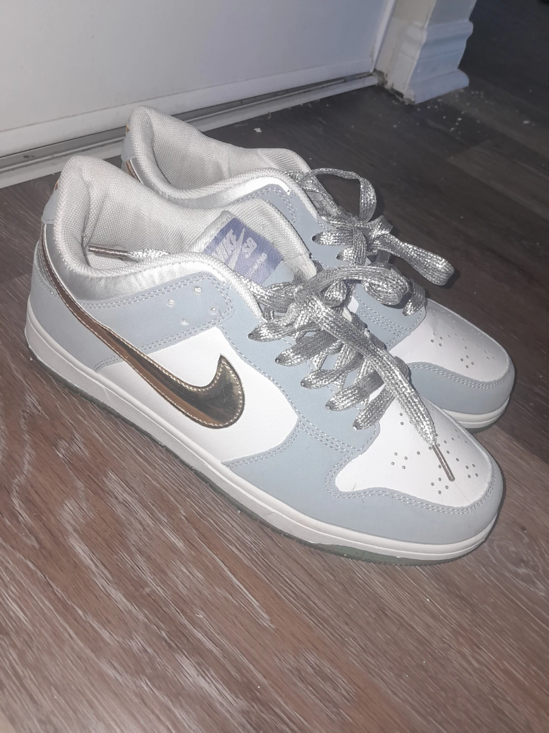 Nike SB Dunk Low Light Blue & White Sneakers
