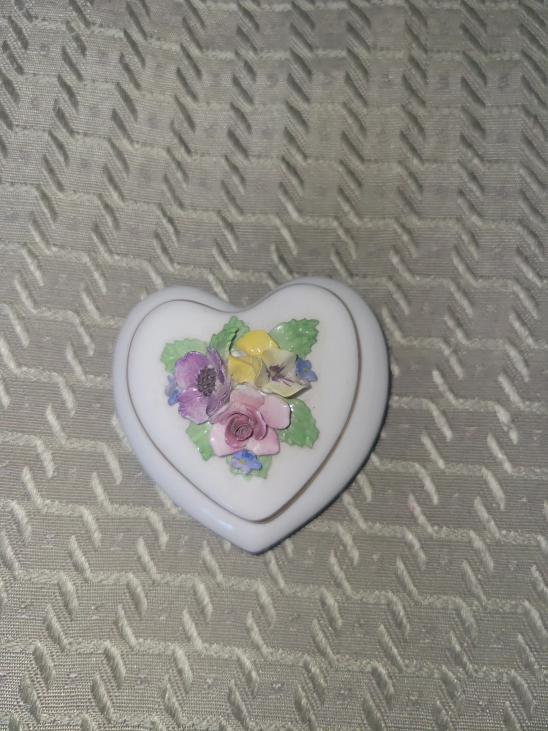 Heart-shaped trinket box with floral design