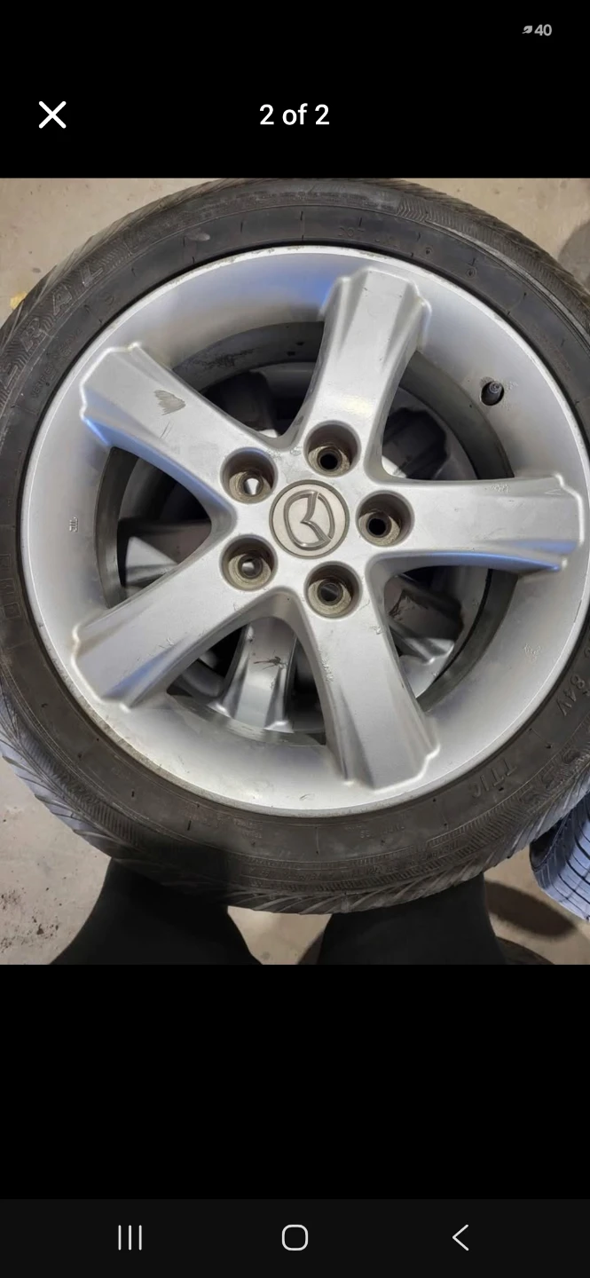 Mazda Super Steel 195/50R16 tires and rims