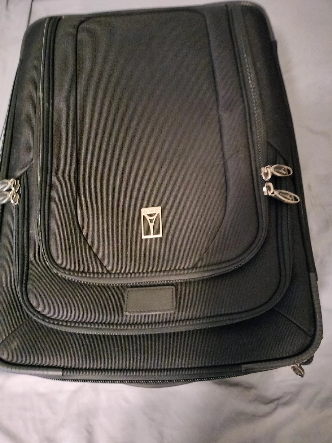Travelpro Black Rolling Suitcase