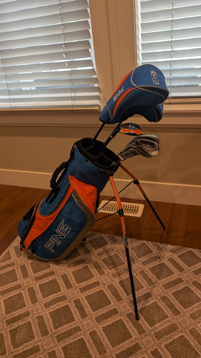 Junior sized Ping golf clubs - left handed