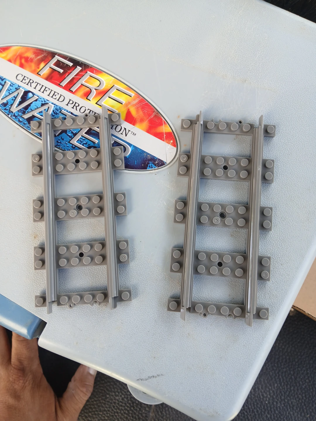 Gray straight building block toy train tracks