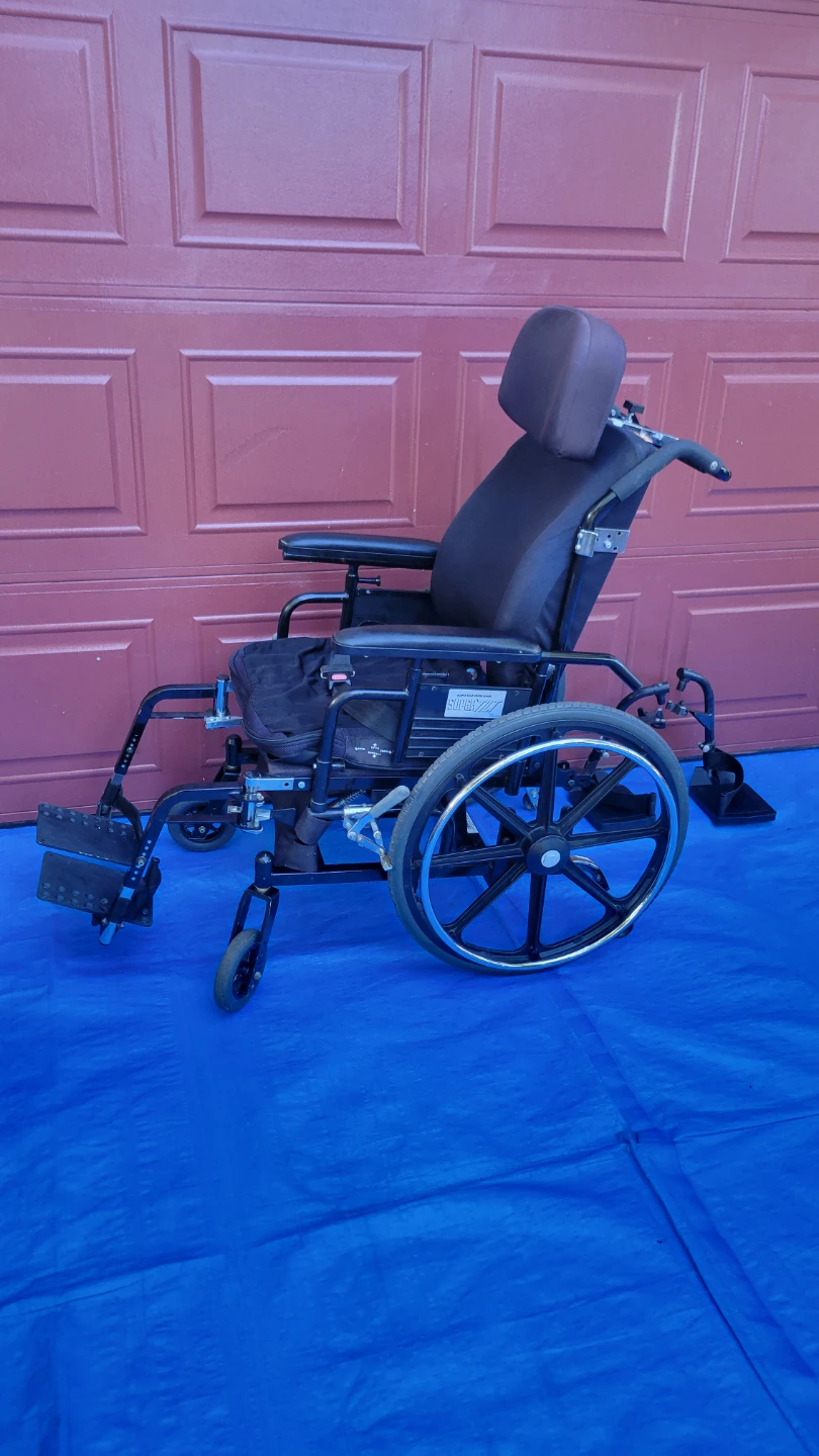 SUPERTILT Wheelchair with Headrest and Detachable Footrests-$190