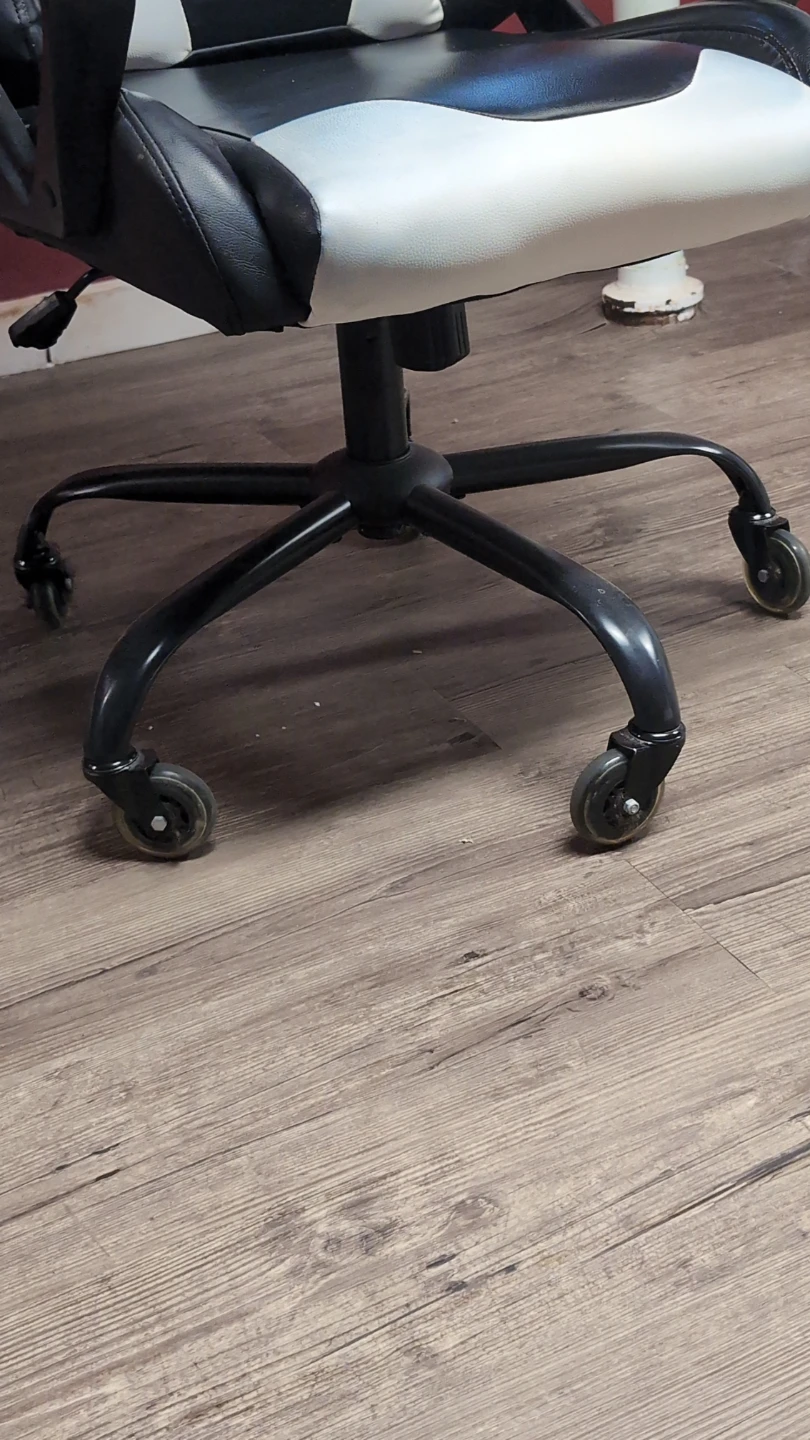 Black and White Gaming Chair With Rollerblade Wheels - photo 2