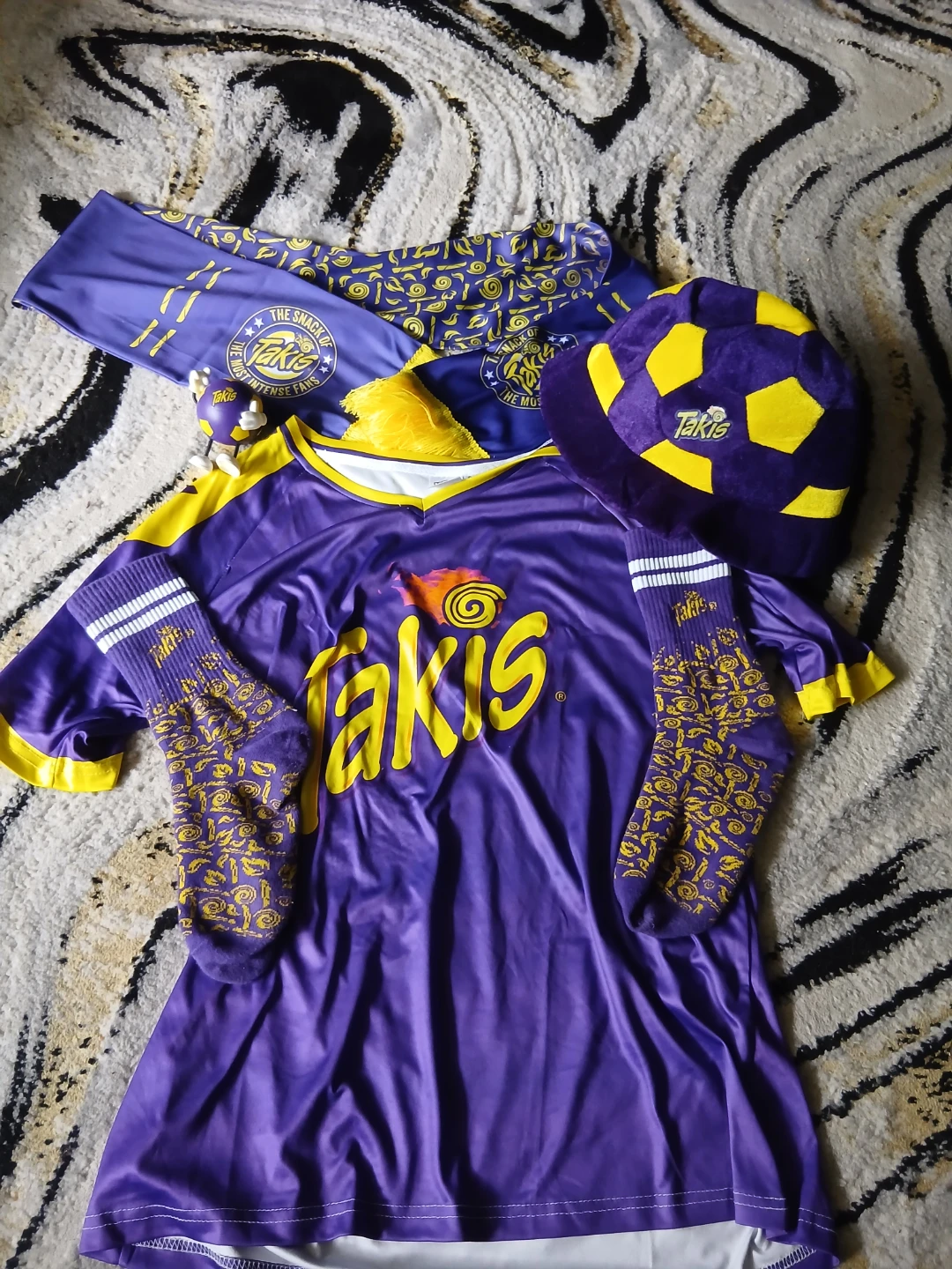 Takis prize box items and clothing!