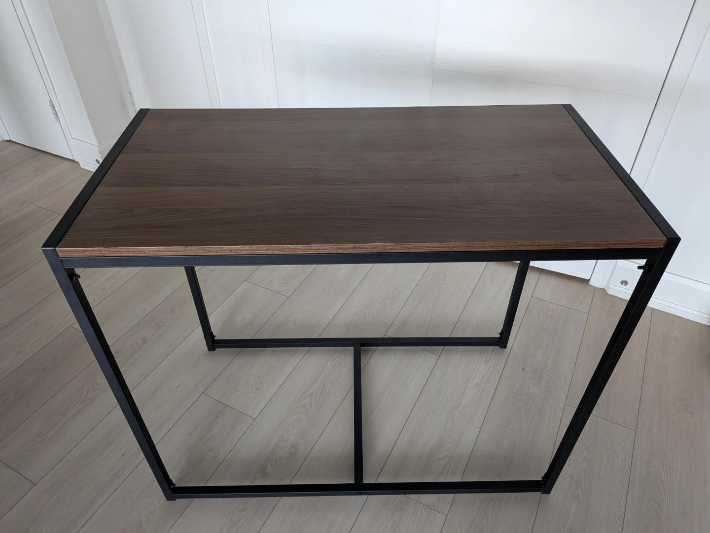 Wood top table with black metal frame