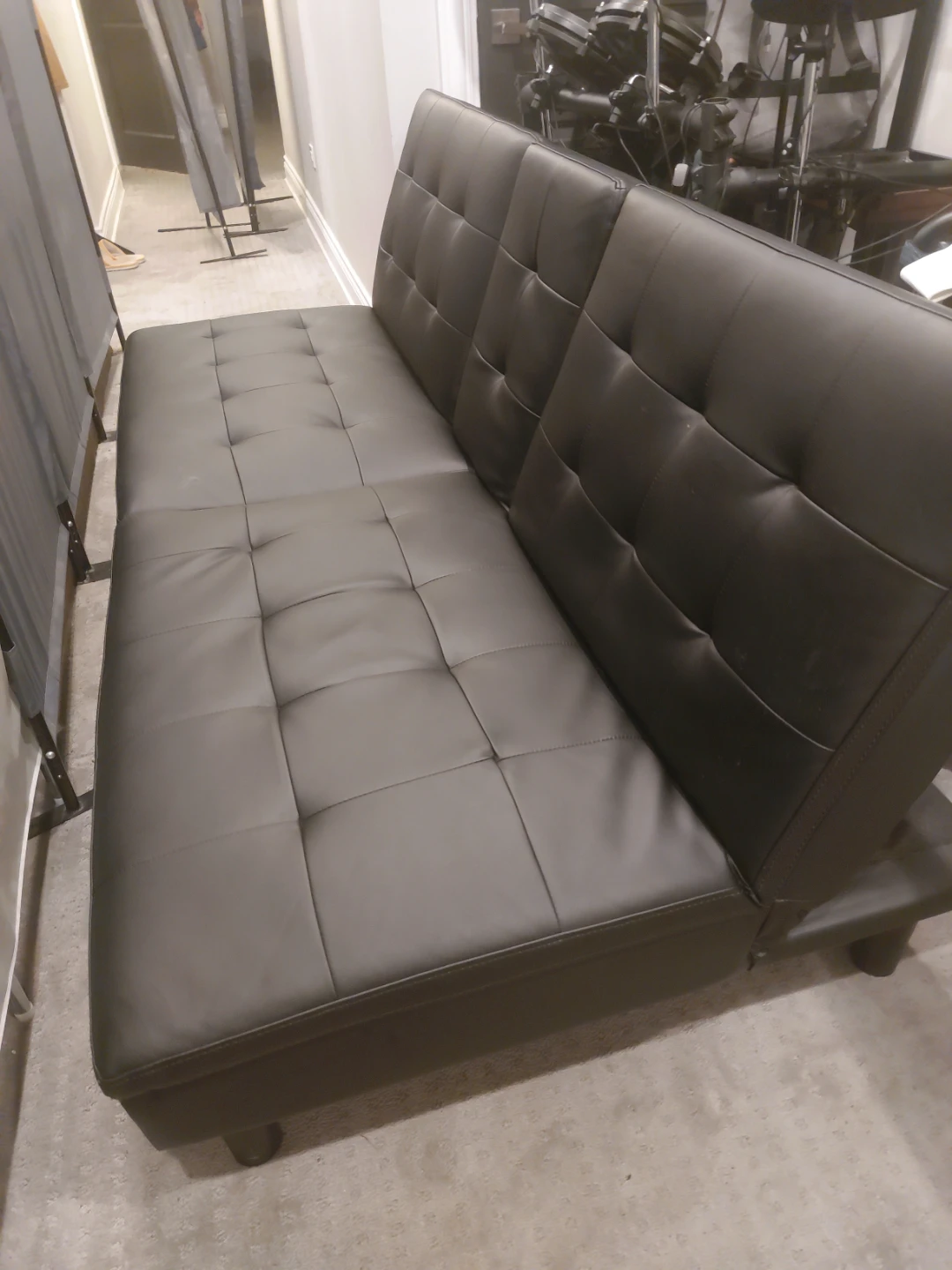 Black Faux Leather Futon Sofa with Cup Holders