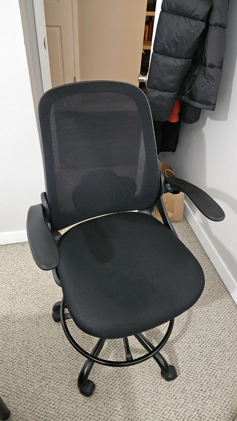 Black mesh ergonomic drafting chair