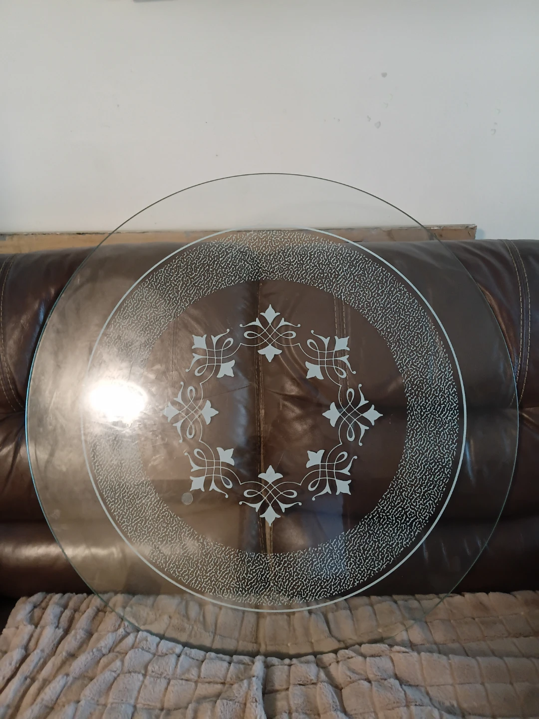 Round glass tabletop with decorative etching