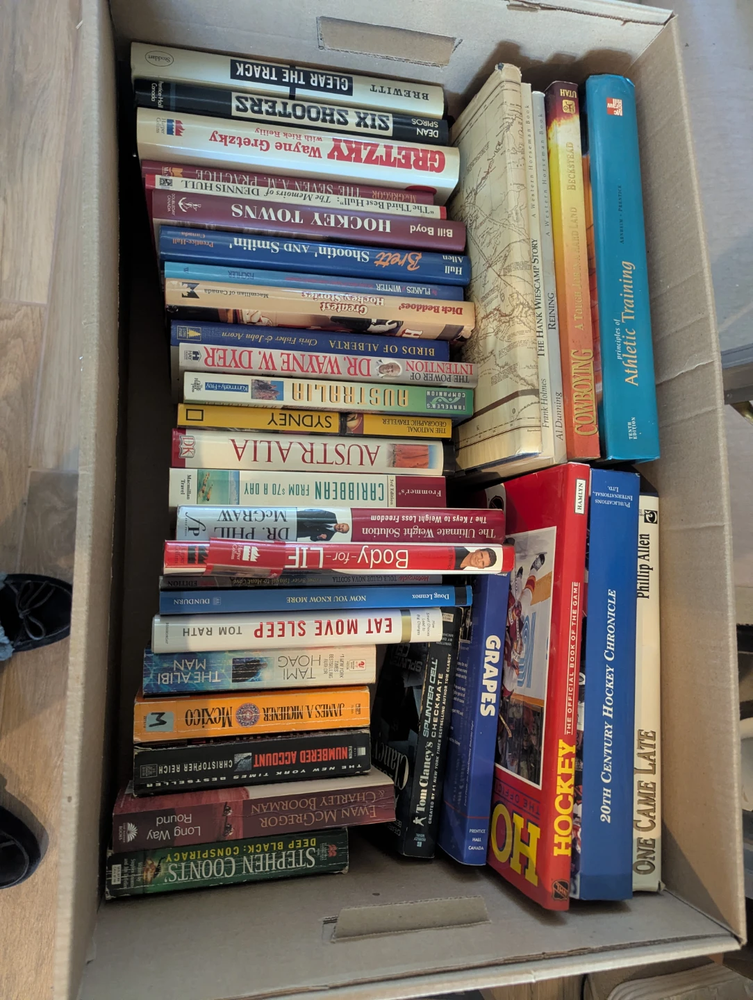 Box of assorted books