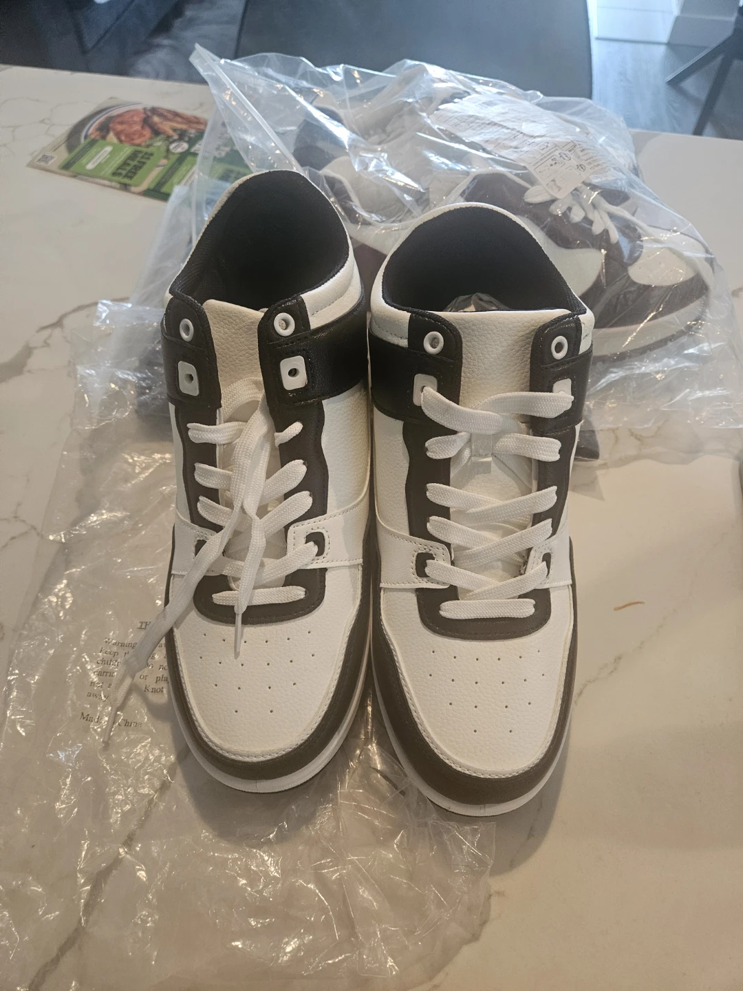 White and Black High-Top Sneakers