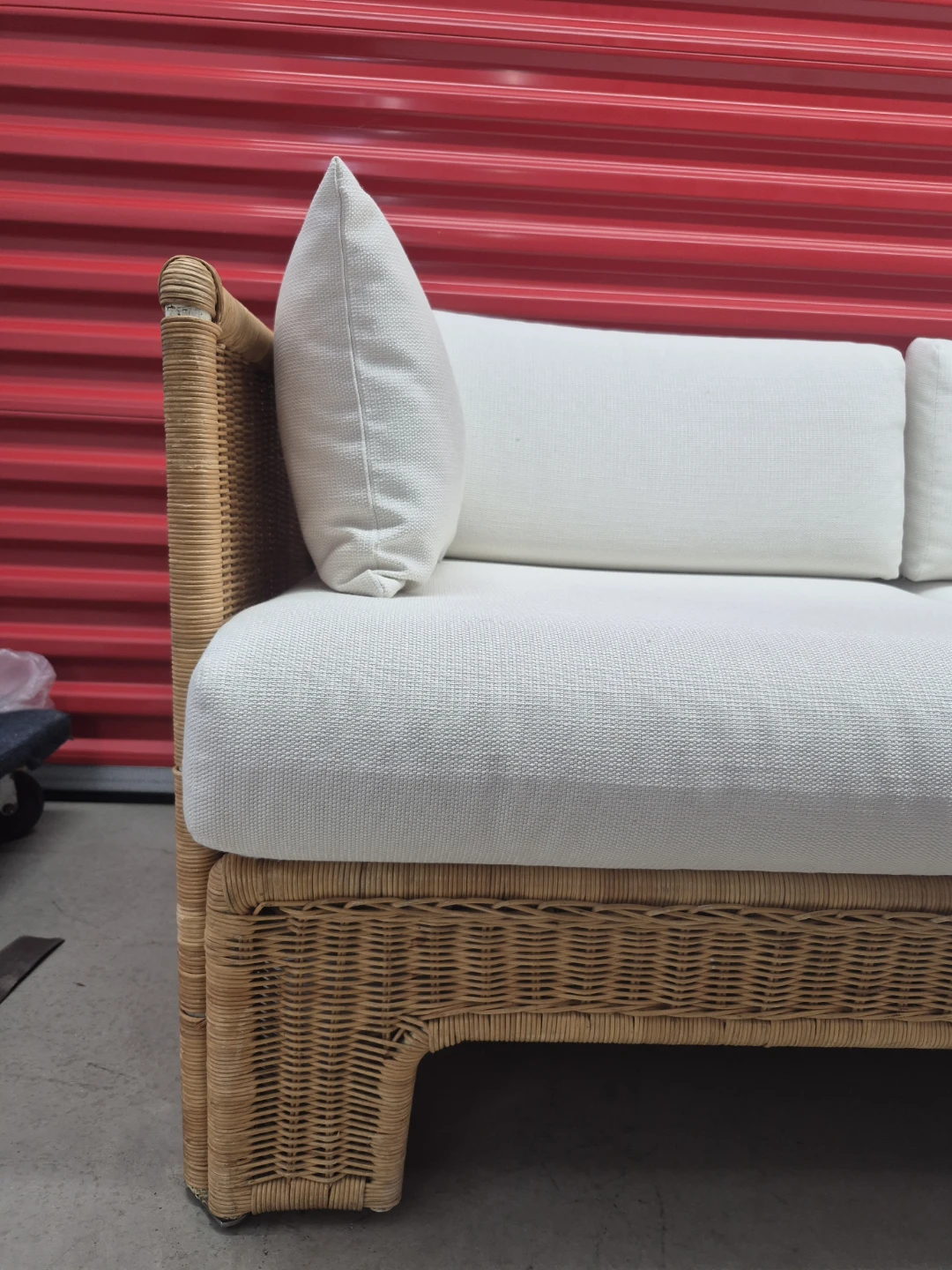 Woven wicker sofa with white cushions - photo 4