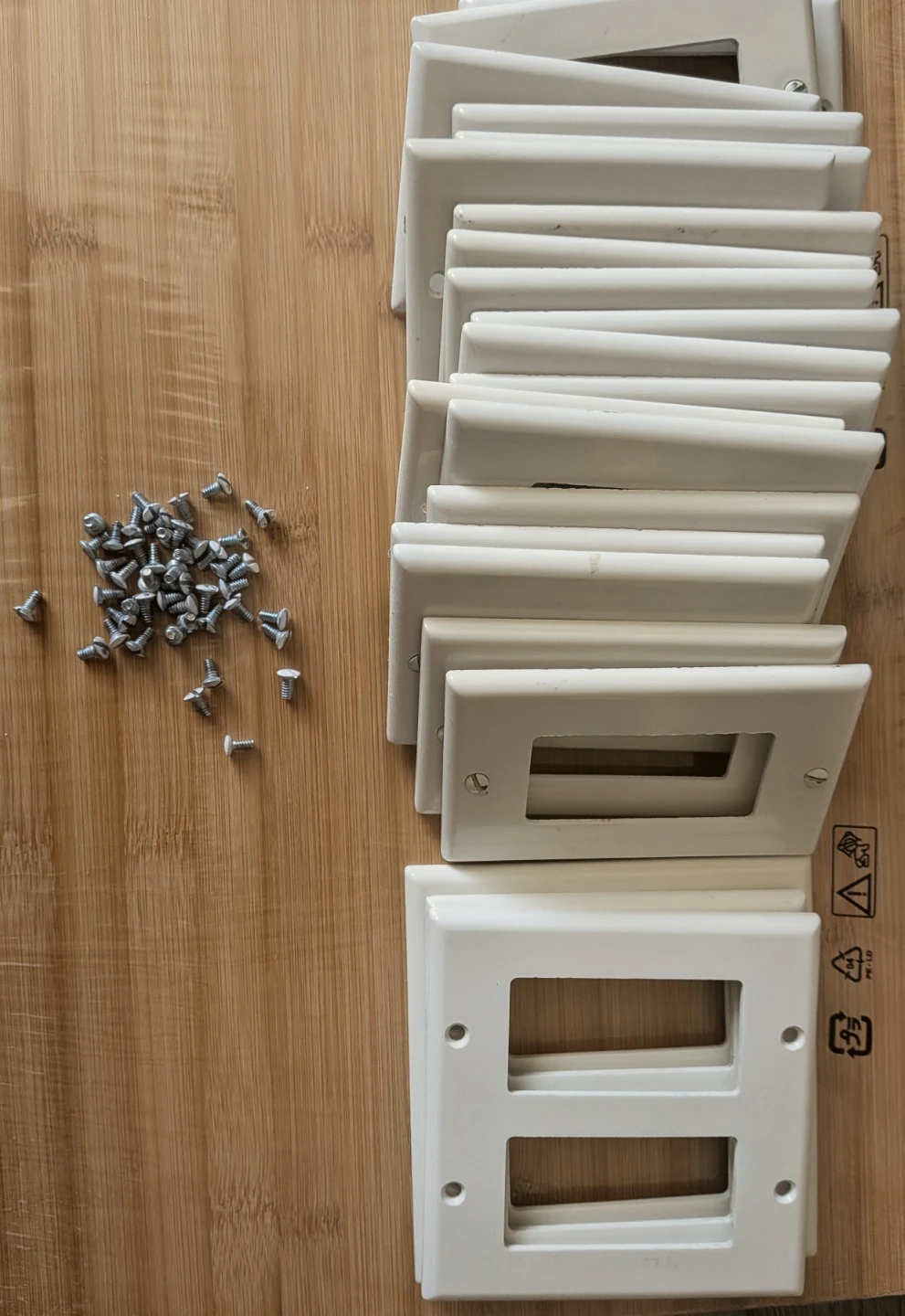 White Decora Outlet and Switch Plates with Screws