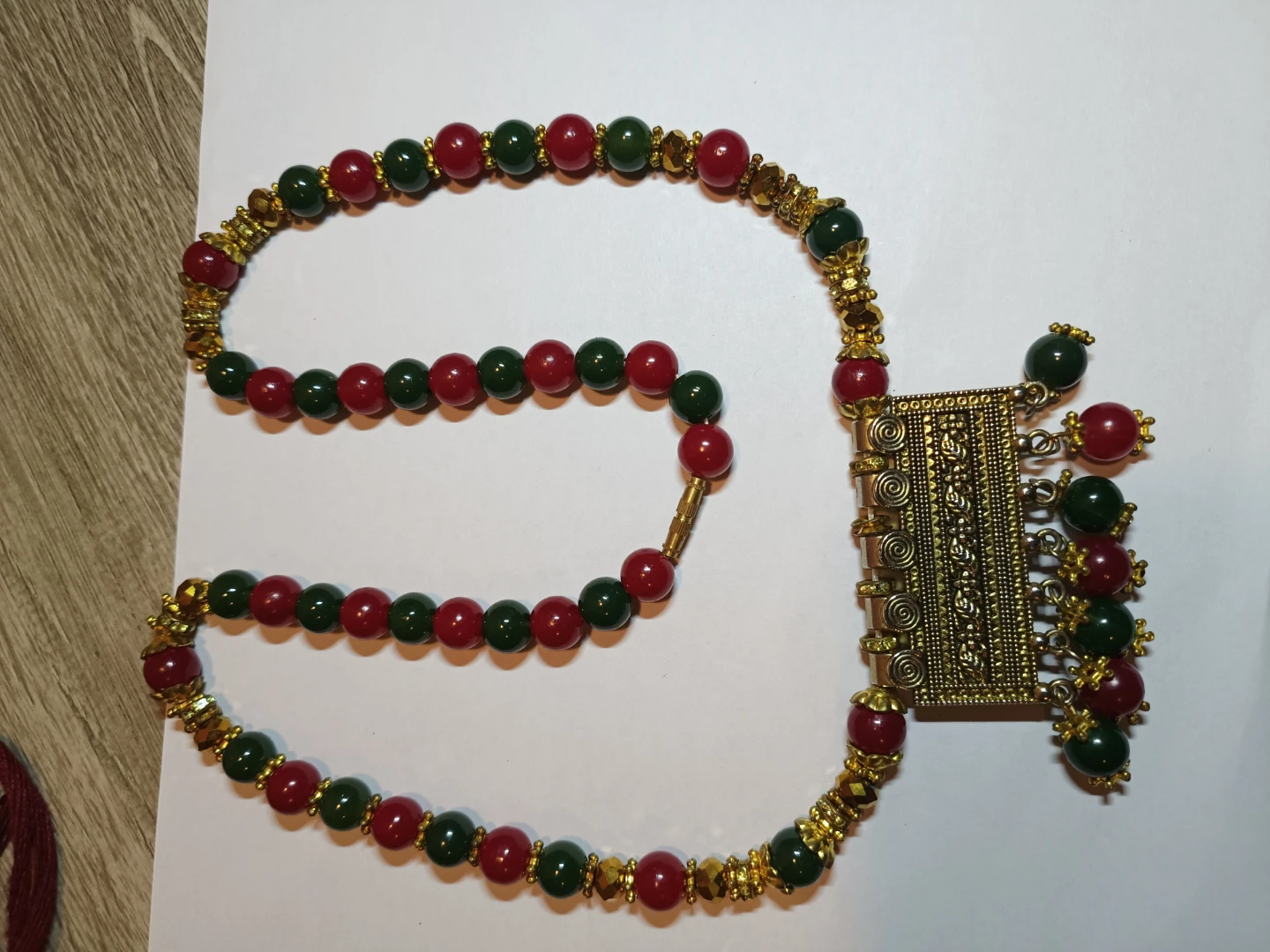 Red and Green Beaded Necklace with Gold Pendant