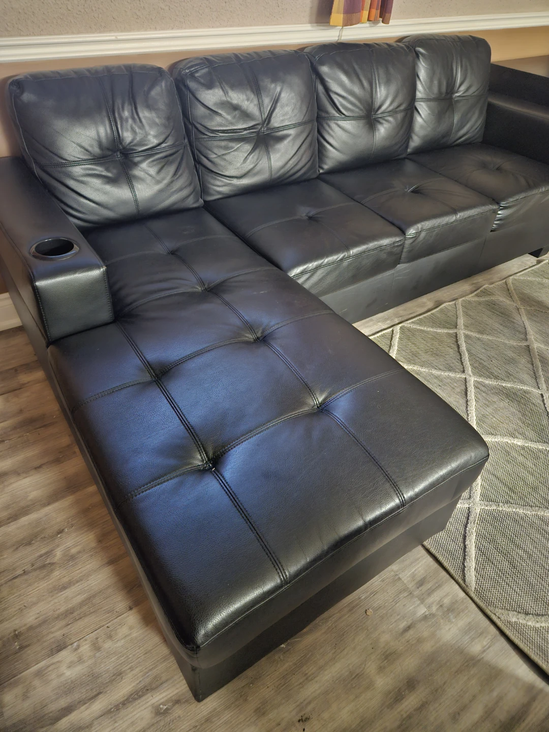 Black Faux Leather Sectional Sofa with Cup Holders