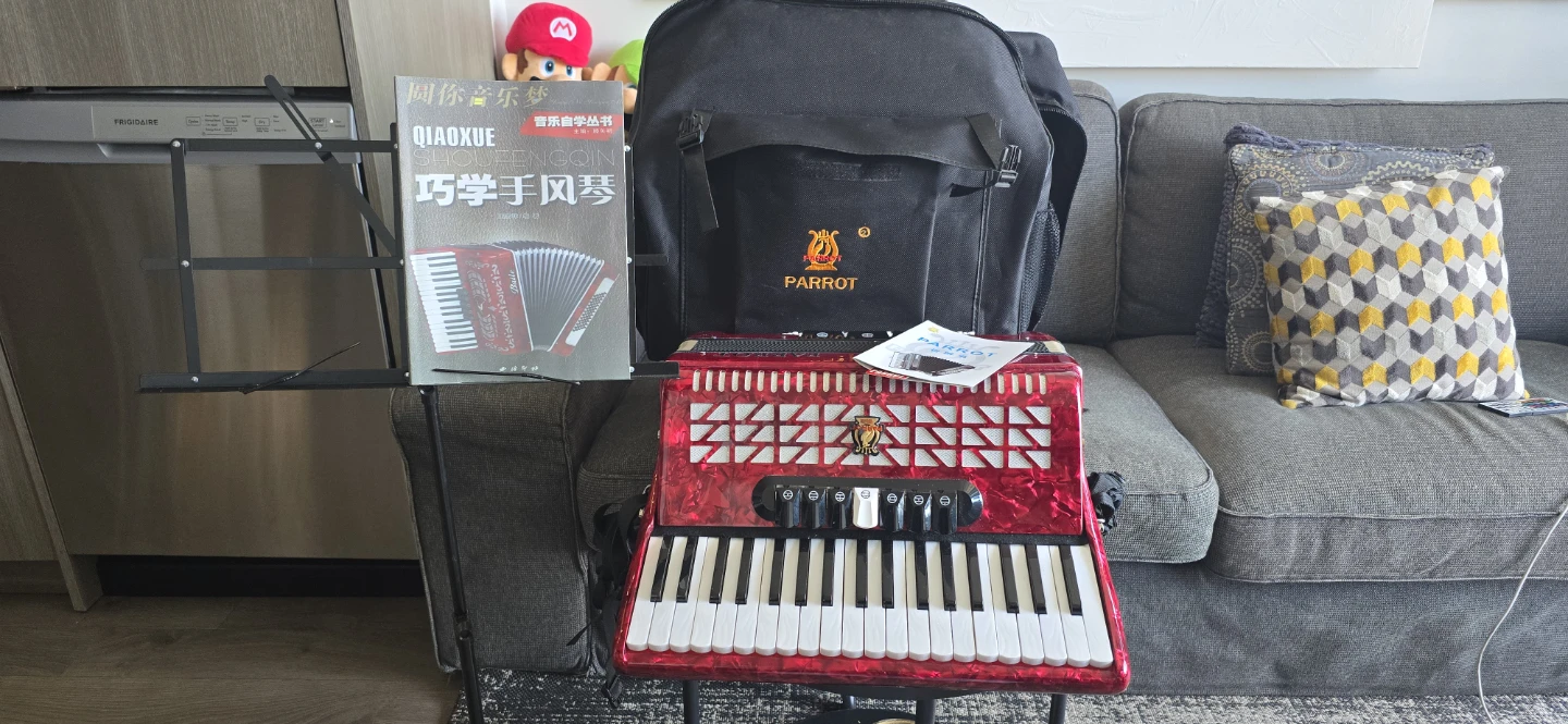 Parrot Red Accordion with Case and Music Book