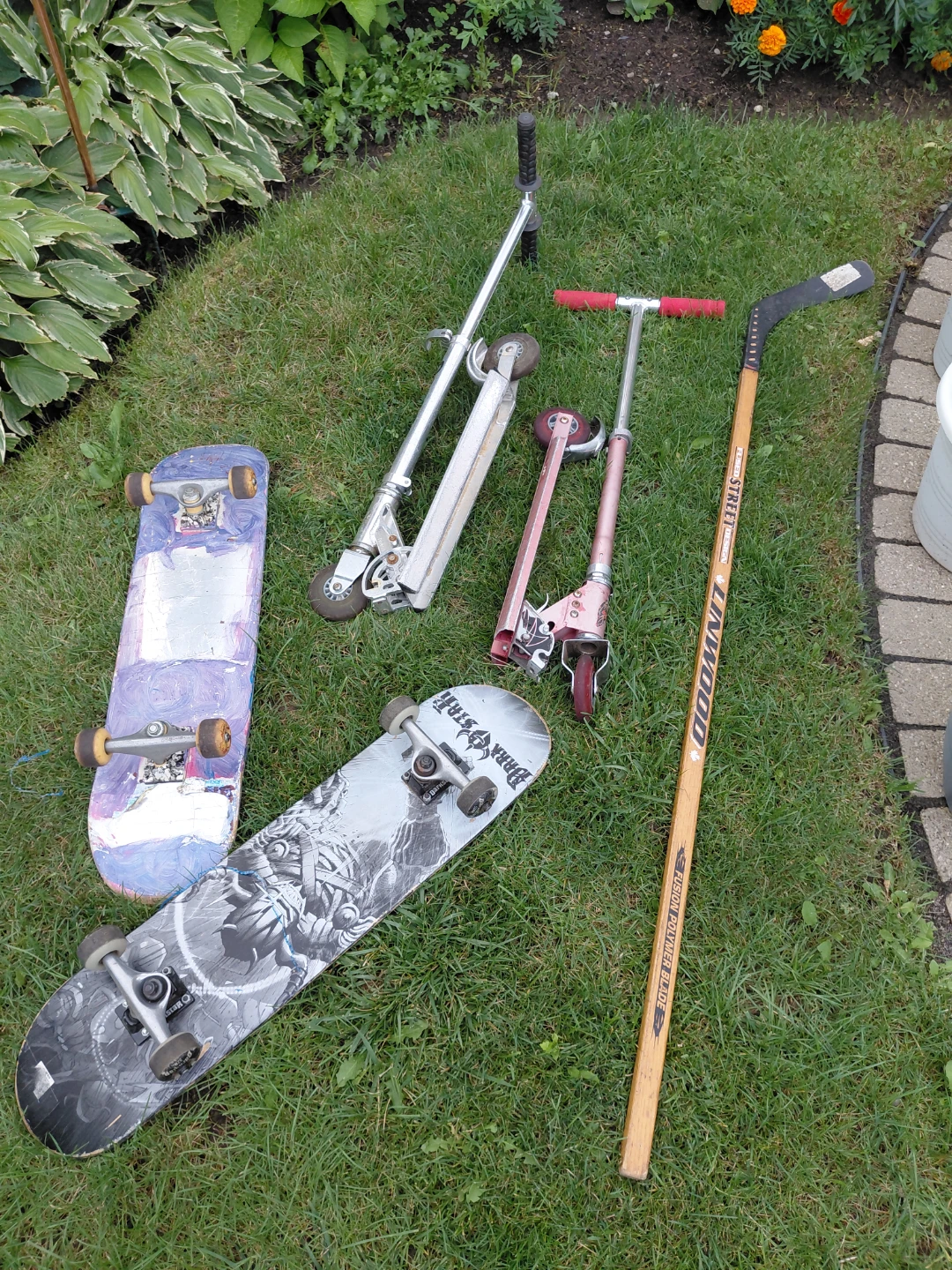 Collection of Scooters, Skateboards & Hockey Stick