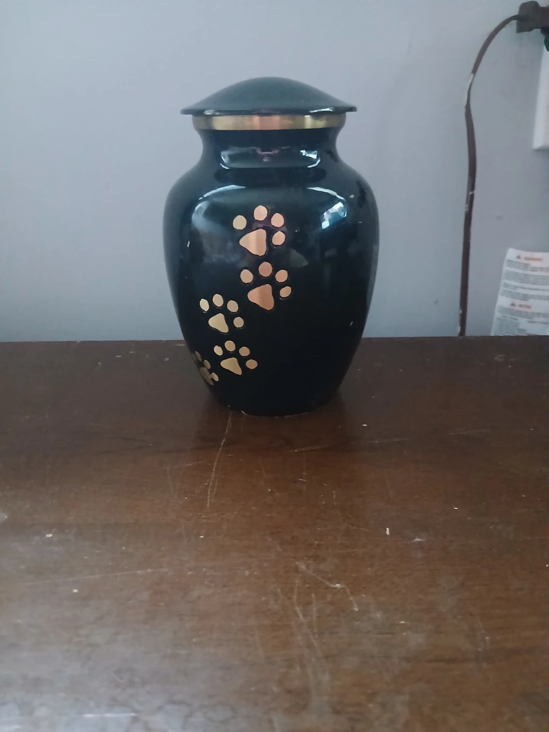 Black Urn with Paw Prints