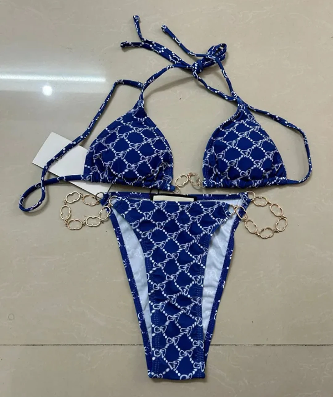 Blue bikini gucci with white monogram pattern