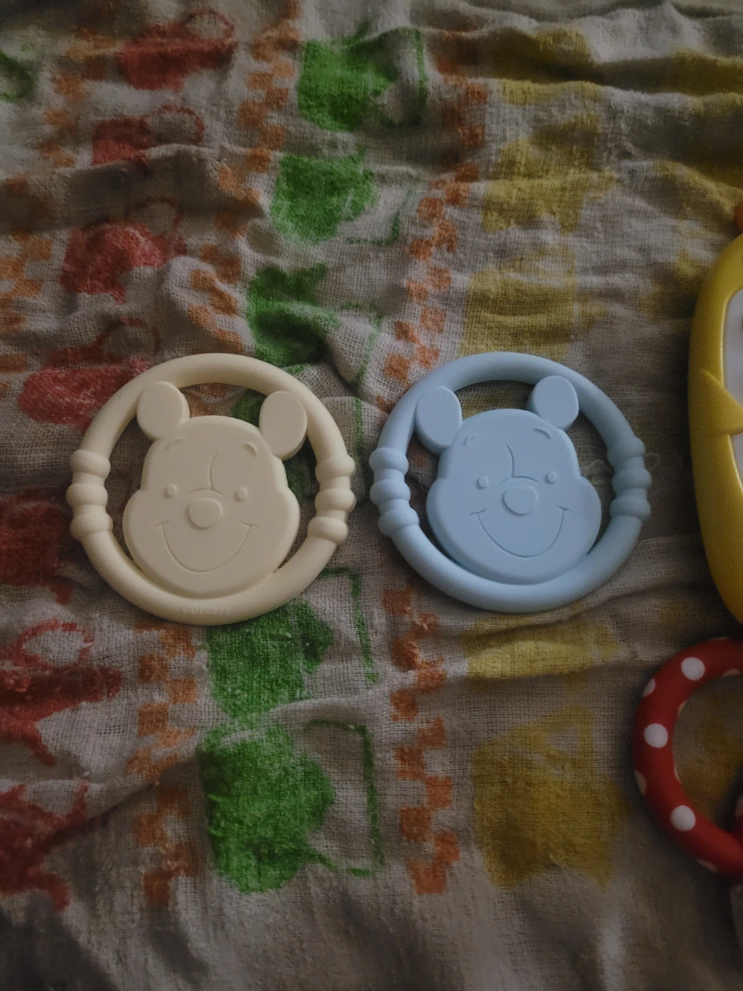 yellow and blue Winnie the Pooh silicone teether ring