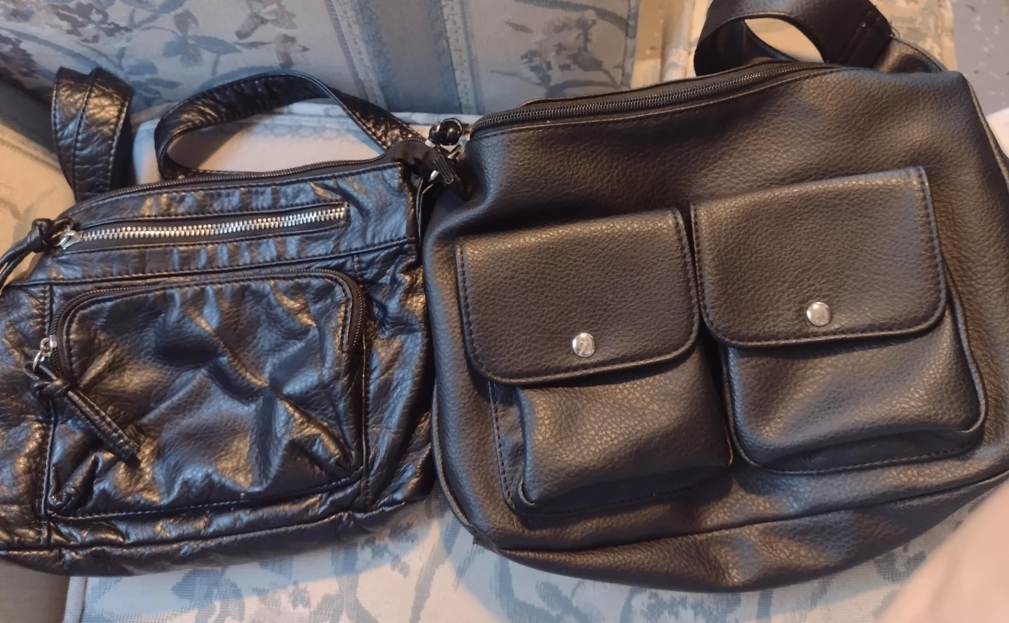 Two black faux leather purses both for $20.00