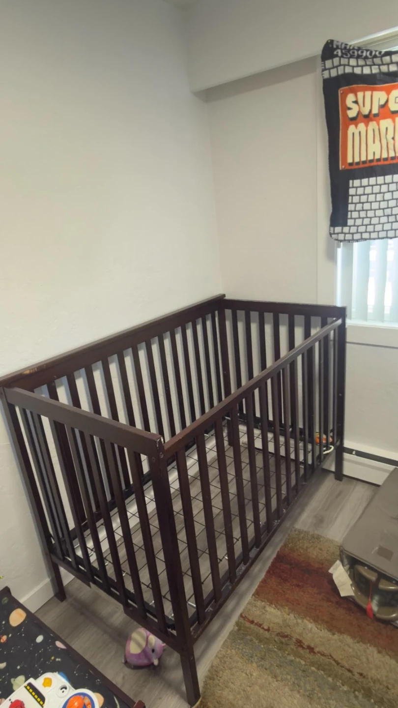 Sturdy Dark Wood Crib with bed frame
