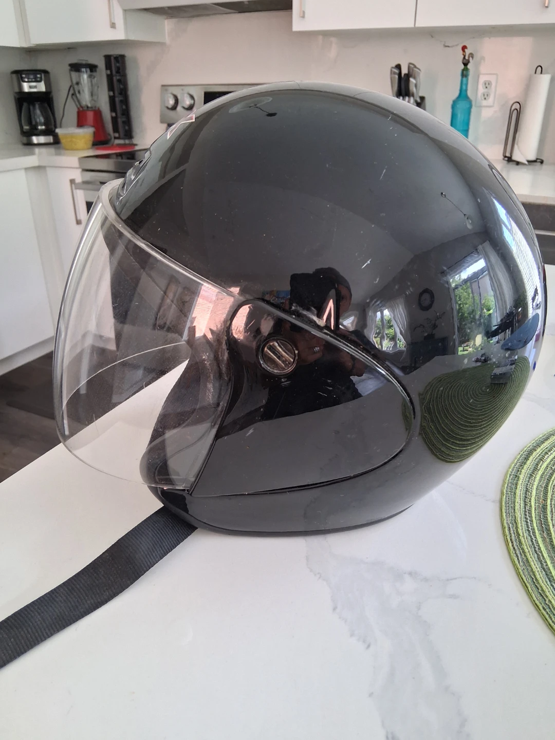 Black CKX VG-975 open face motorcycle/snowmobile helmet