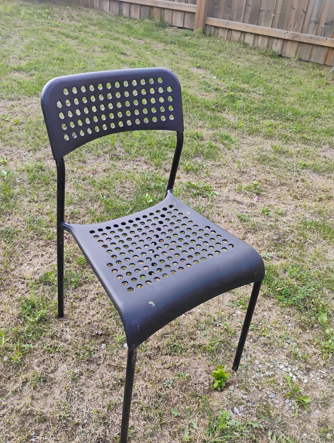 Ikea Black Stackable Plastic Chairs (Set of 4) - photo 2